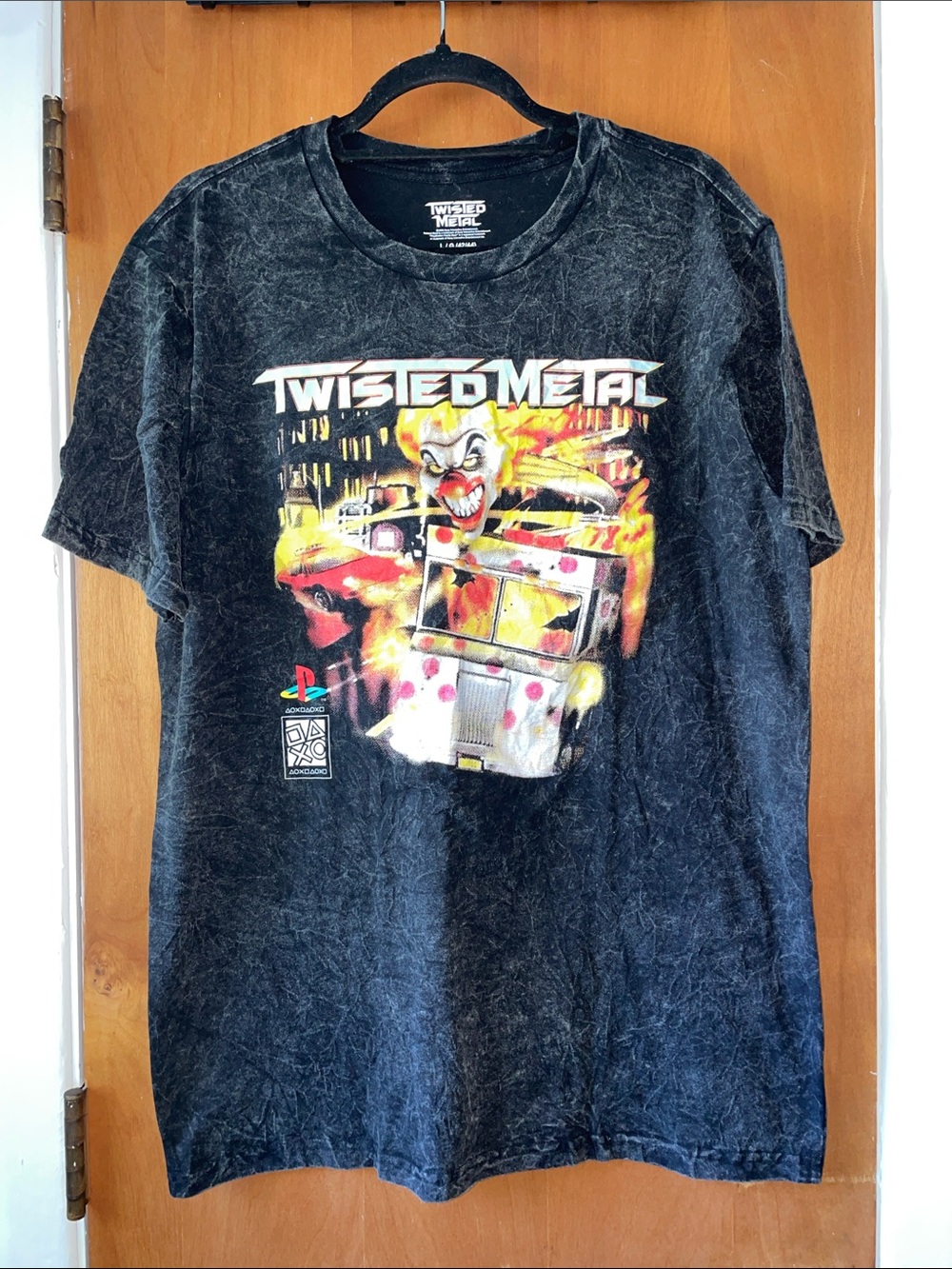 Twisted Black Graphic Tee with Yellow & Red Artwork